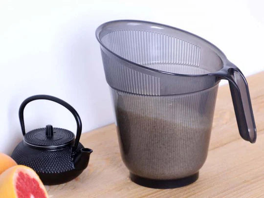 Bucket with strainer