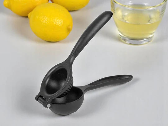 Black hand lemon squeezer