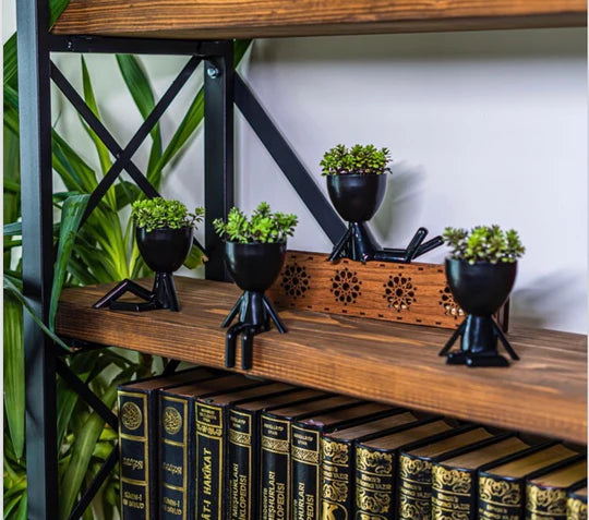 Playful Mini Humans Flower Pot with Flowers